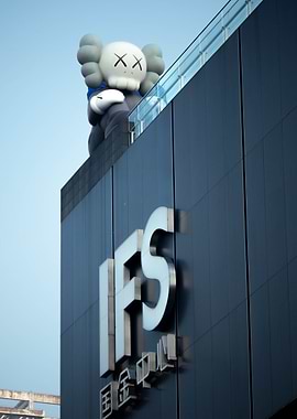 KAWS sculpture on IFS building