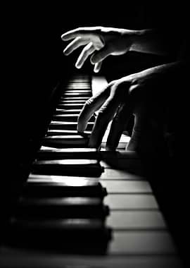Piano Keys and Hands in Monochrome