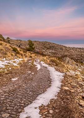 Mountain Trail at Sunset with Snow