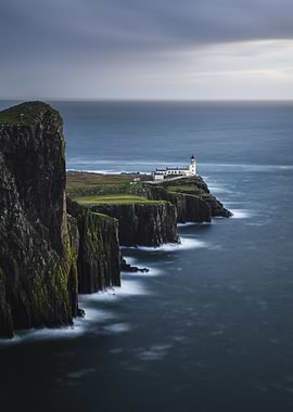 Lighthouse on Cliffside at Dusk