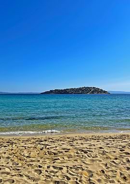 Beach with Island and Blue Sky