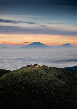 The lonely tent above a sea of clouds
