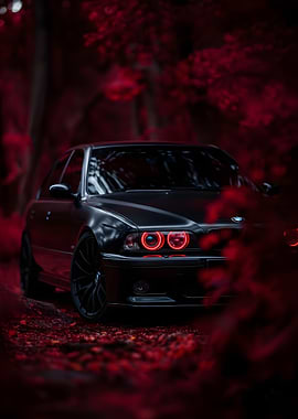 Black BMW with Red Headlights