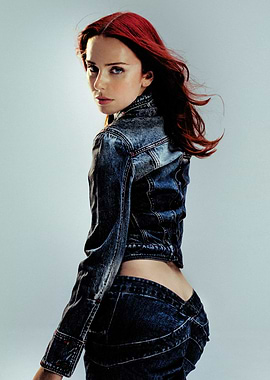 Woman in Denim Jacket and Jeans rose