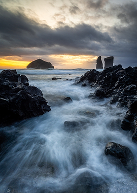 Coastal Rocks and Ocean at Sunset