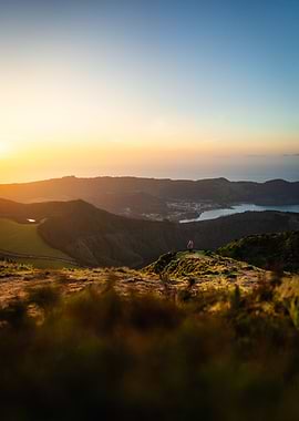 Person Overlooking Landscape at Sunset