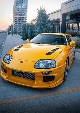 Yellow Toyota Supra parked outdoors