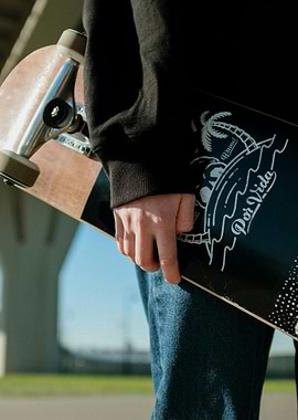 Skateboard with 'Por Vida' Design