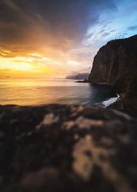 Coastal Sunset with Cliffs and Ocean