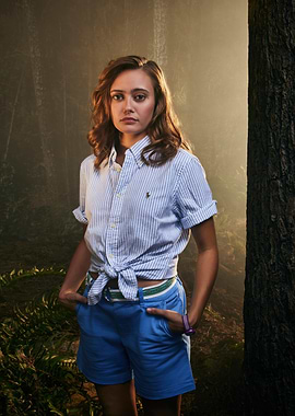 Woman in Blue Shorts and Shirt ella purnell