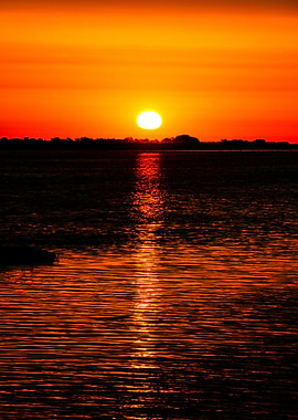 Fiery Sunset Over Water