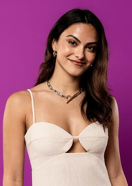 Camila Mendes portrait on purple background