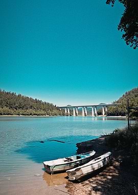 Lake with Boats and Bridge