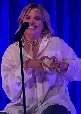 Singer making heart gesture on stage