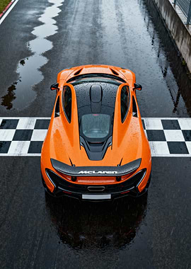 Orange McLaren P1 on Wet Racetrack
