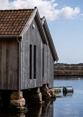 Wooden Boathouse on Water - Norway