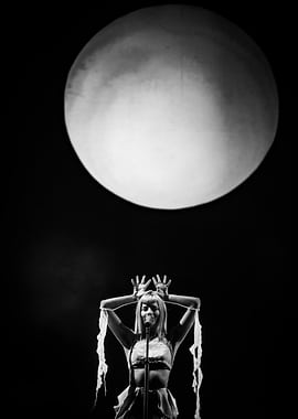 Black & White portrait of Aurora performing under the Moon