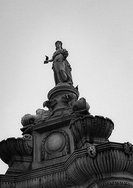 Black and White Statue with Bird
