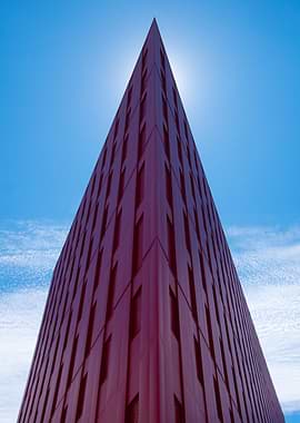 Modern Red Building Against Blue Sky