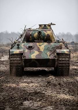 Camouflaged Tank in Muddy Field