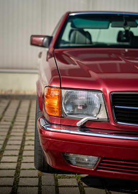 Maroon Car Front View Close-Up