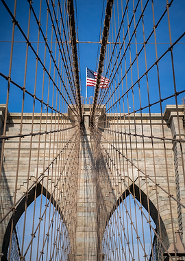 Brooklyn Bridge, New York with American Flag