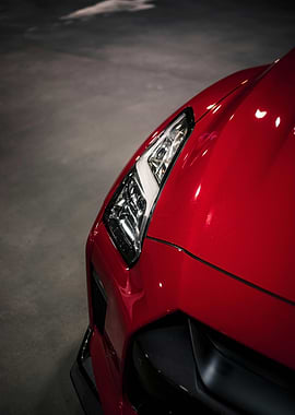 Red Car Headlight Close-Up