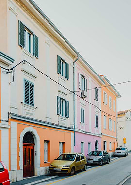 Colorful buildings and cars on street