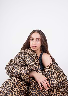 Woman in Leopard Print Puffer Jacket