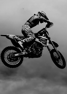 Motocross rider jumping