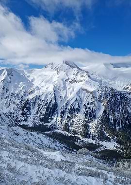 Snowy Mountain Peak Under Blue Sky