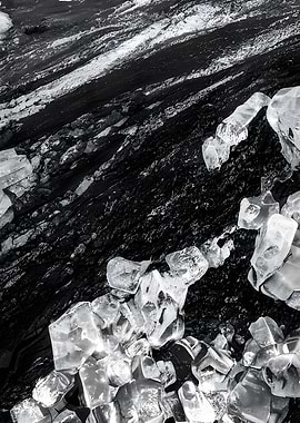 Black sand beach with ice fragments