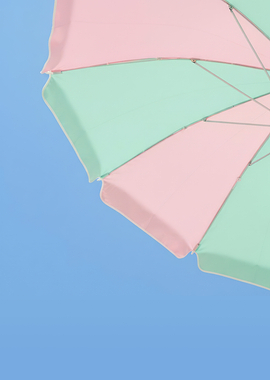 Summer Pastel Beach Umbrella Against Blue Sky