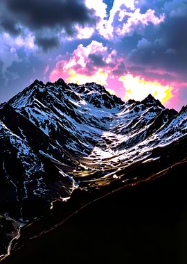 Snowy Mountain Peaks at Sunset