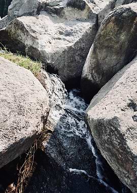Rock Stream Flowing Between Large Stones