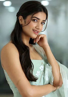 bhagyashri borse of a woman in green dress