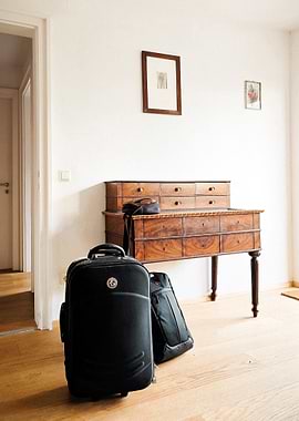 Suitcases in a bright room