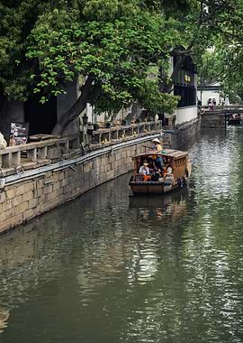 Canal boat tour in Asian city