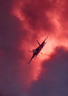 Fighter Jet in Red Sky