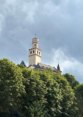 Medieval Castle Tower Amidst Green Trees