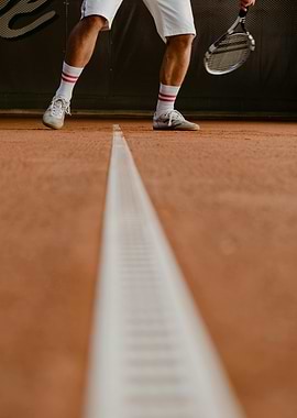 Tennis Player on Clay Court