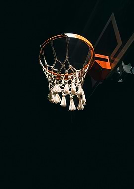 Basketball hoop against a dark background