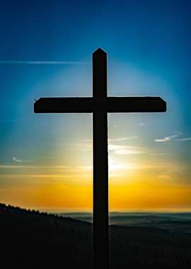 Silhouette of a Cross at Sunset