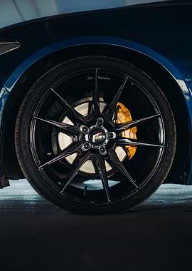 Blue Car Wheel with Black Rim