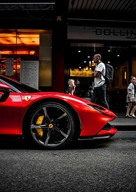 Red Ferrari on City Street