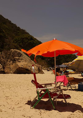 Beach scene with a colorfulumbrella