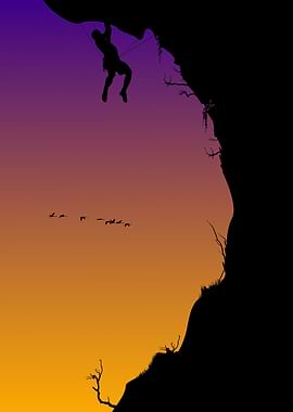 Silhouette of a Free Climber at Sunset