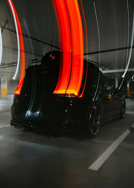 Black car with light trails