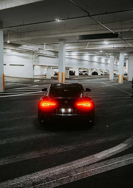 Black car in parking garage