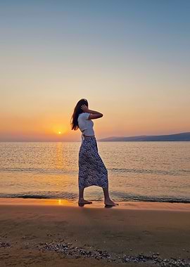 Woman on Beach at Sunset